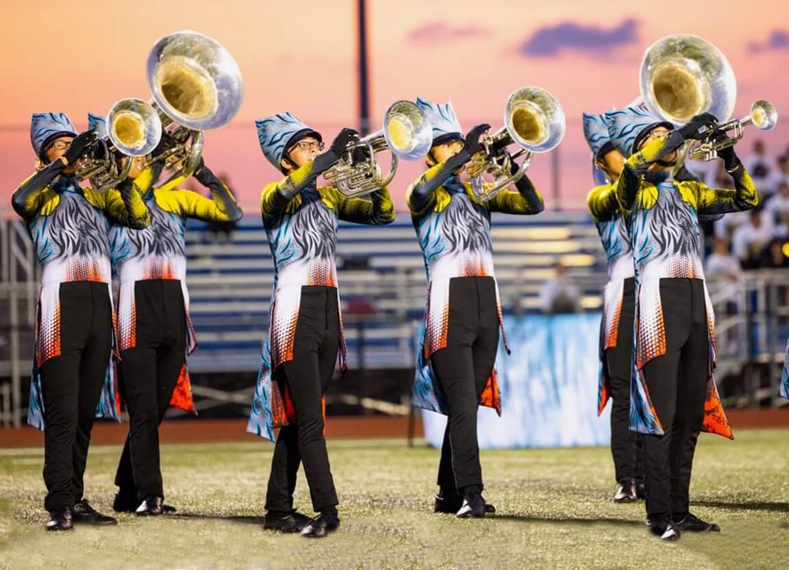 Marching band playing brass instruments.